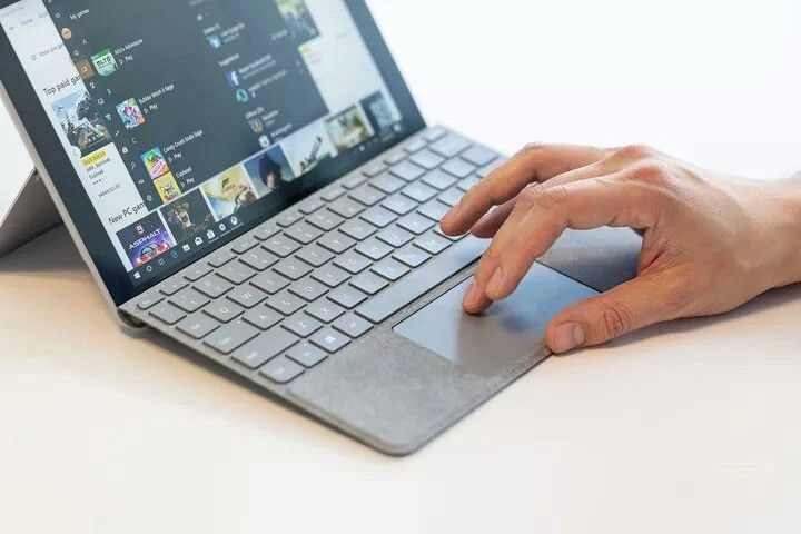 Compact laptop with touchpad use at the best laptop shop in Calicut