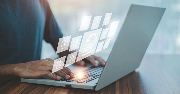 Man using a laptop for work at the best laptop shop in Calicut